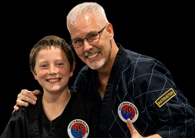 Grandmaster James Theros with student